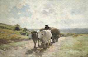 Clear road with farmer and cattle